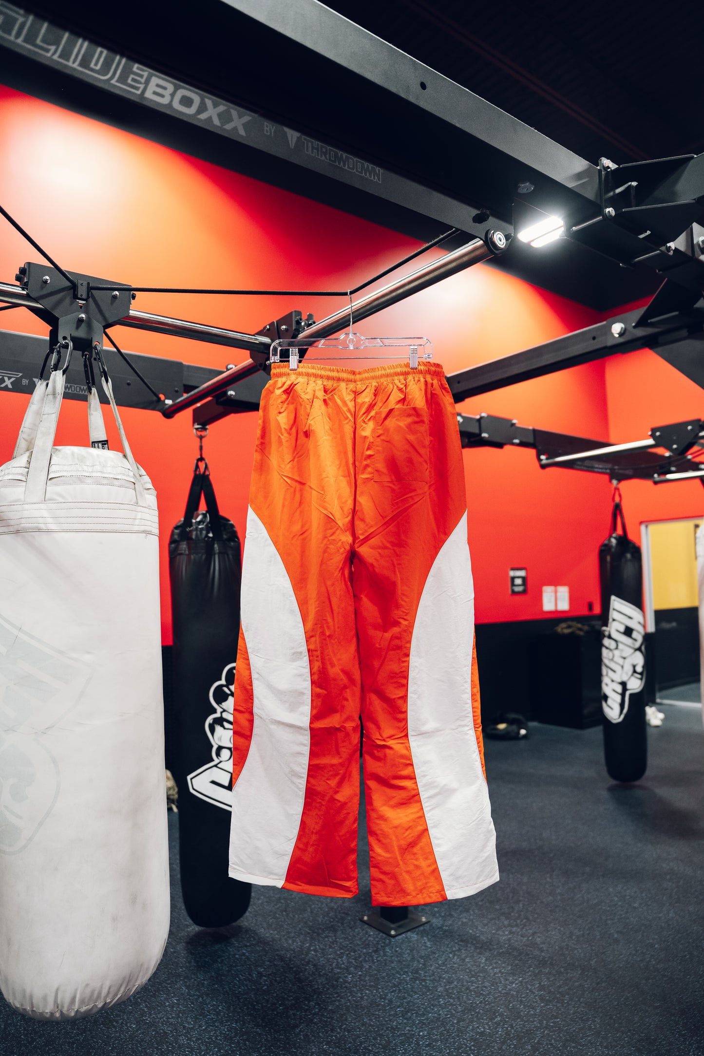 RED POWER MOVES BAGGY TRACKPANTS