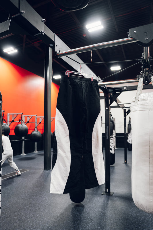 BLACK POWER MOVES BAGGY TRACKPANTS