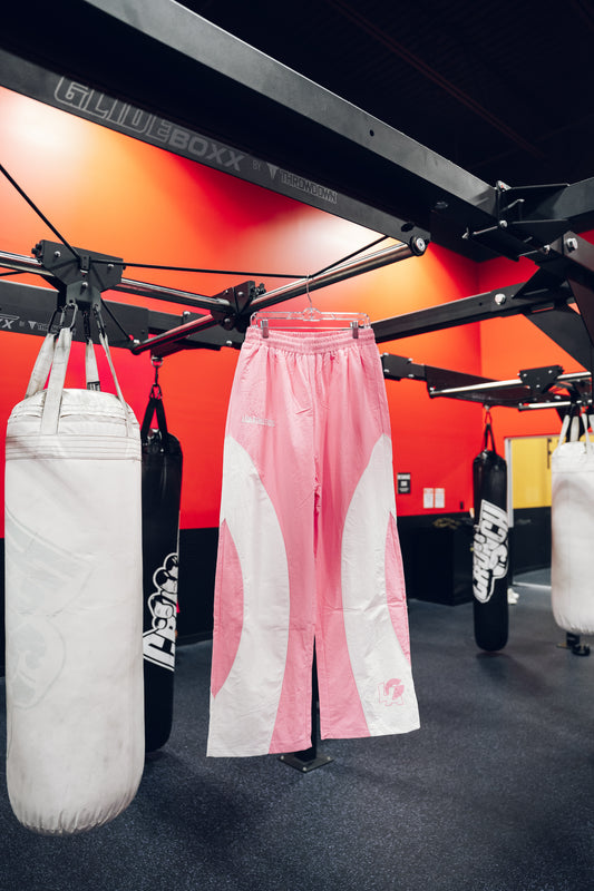 PINK POWER MOVES BAGGY TRACKPANTS