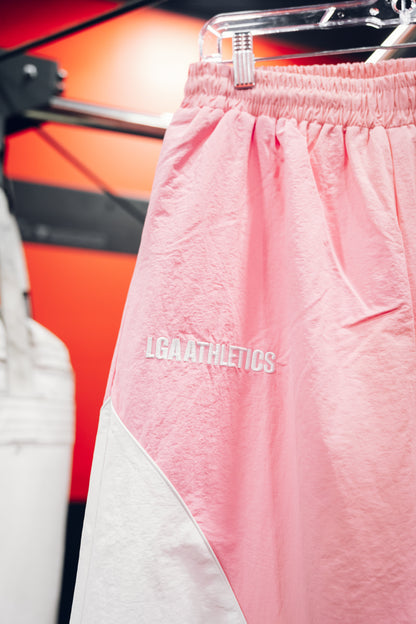 PINK POWER MOVES BAGGY TRACKPANTS