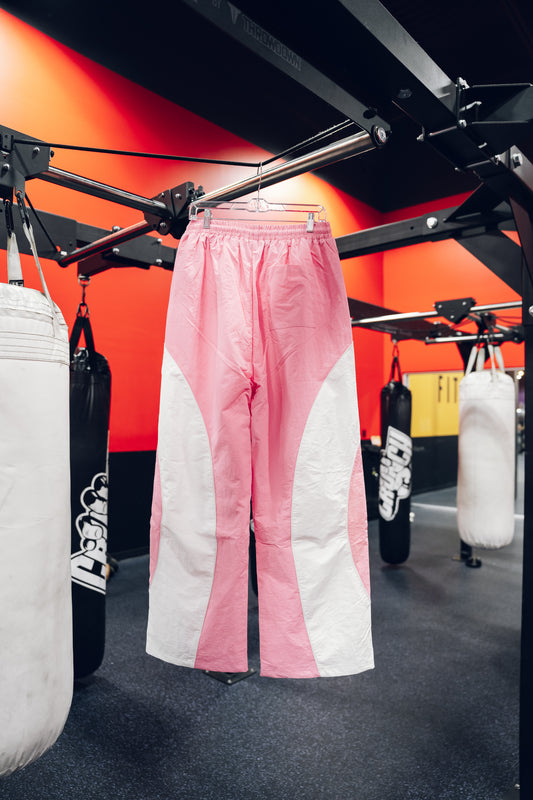 PINK POWER MOVES BAGGY TRACKPANTS