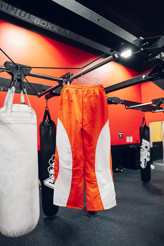RED POWER MOVES BAGGY TRACKPANTS