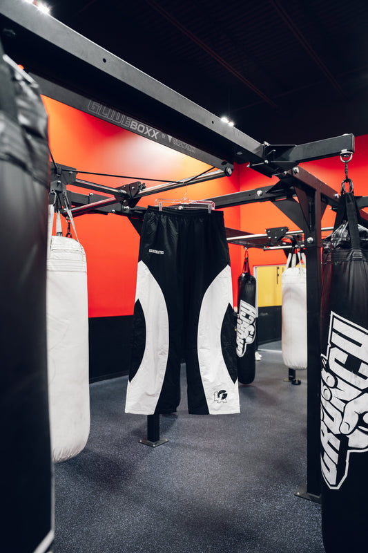 BLACK POWER MOVES BAGGY TRACKPANTS